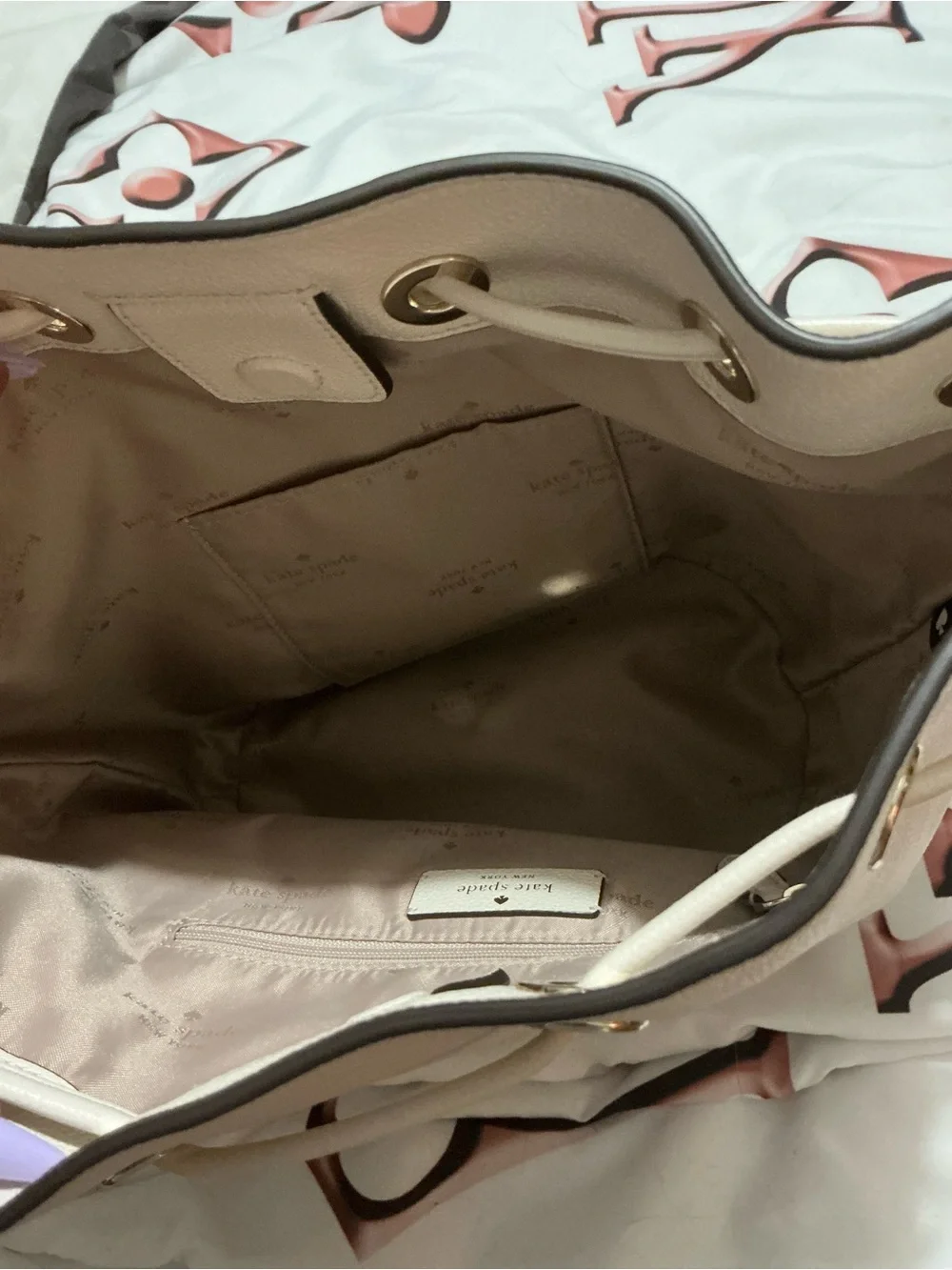 kate spade cream leather drawstring bucket shoulder bag